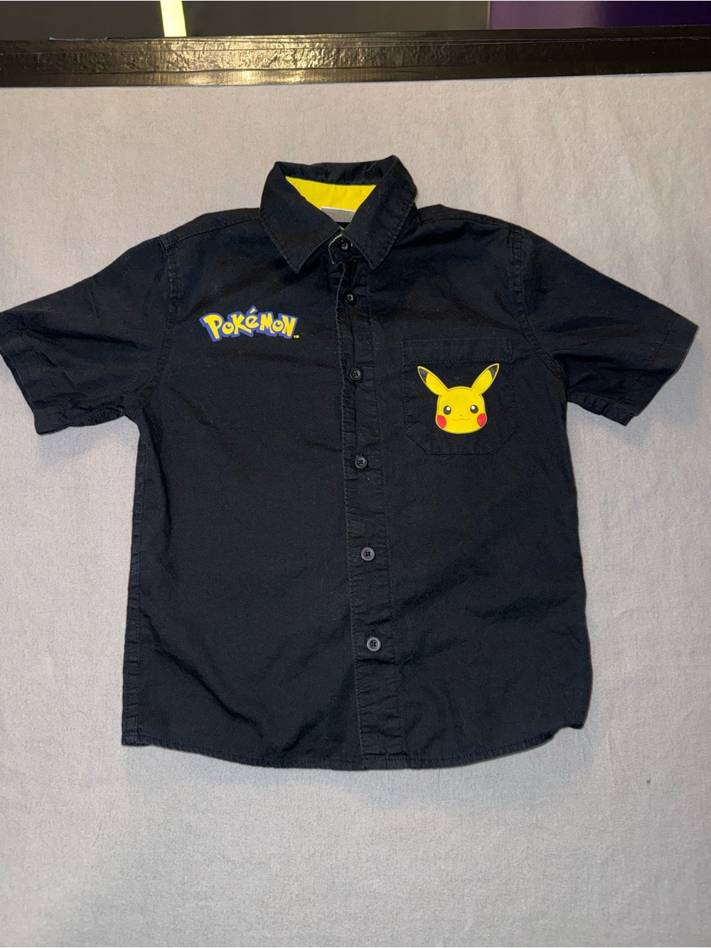 Pokemon Black Short-Sleeve Button-Down Shirt with Yellow Pikachu Detail